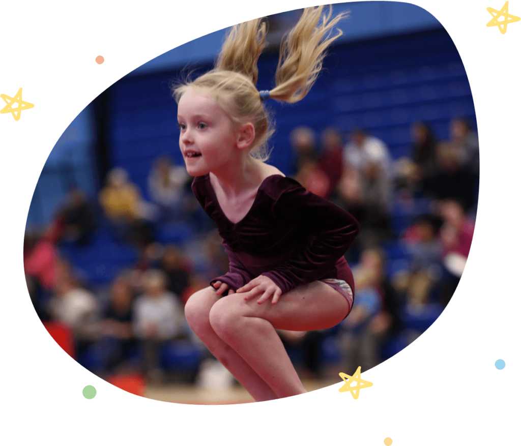 Child jumping at her gymnastics classes