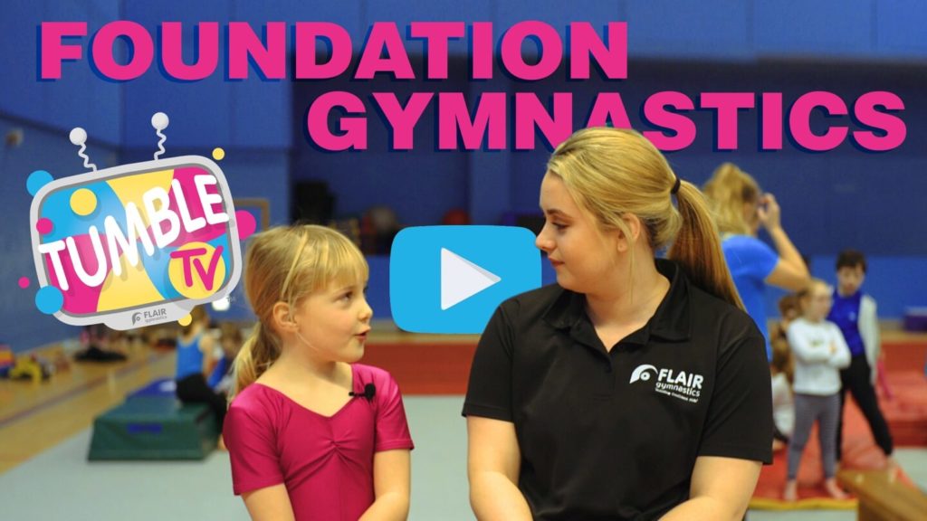 Child and coach at foundation gymnastics class
