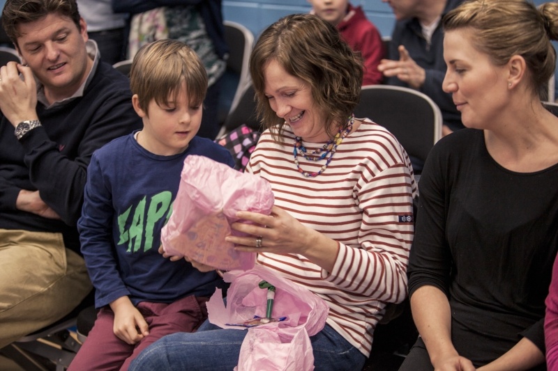 Get ready for a new start at your gymnastics club - family playing pass the parcel
