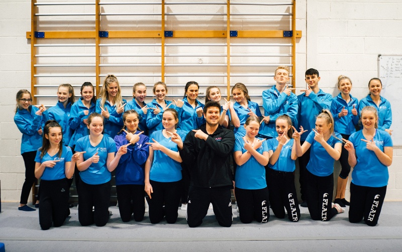 Richard Dwyer (Flair Founder & CEO) with his team of gymnastics coaches