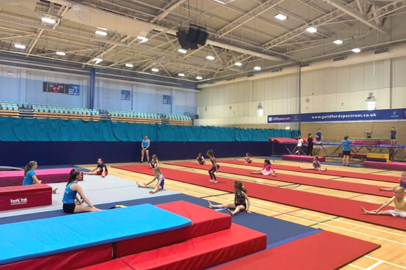 Children warming up safely distanced at their gymnastics club